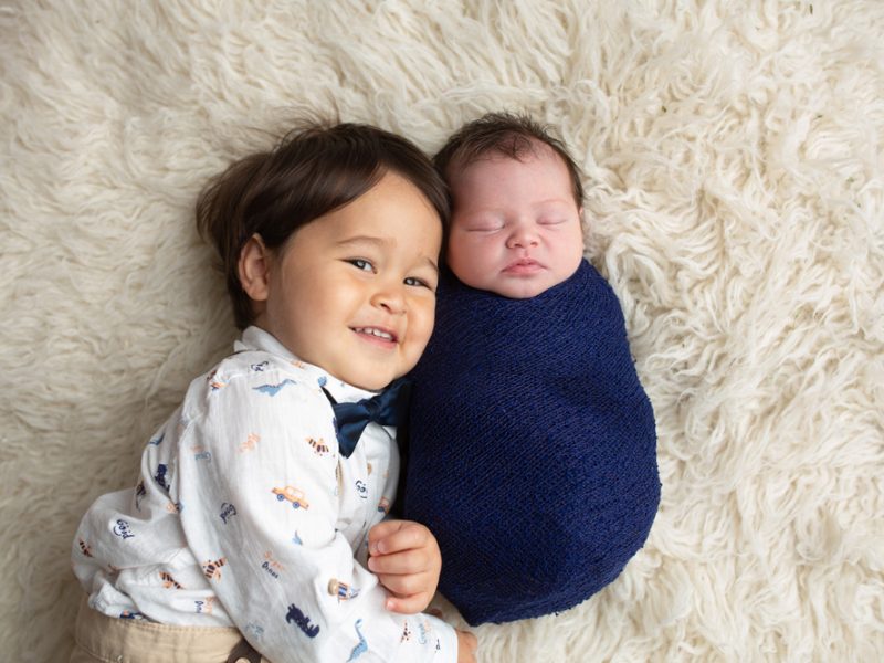 toddler-laying-with-newborn-brother-for Adelaide-newborn-shoot