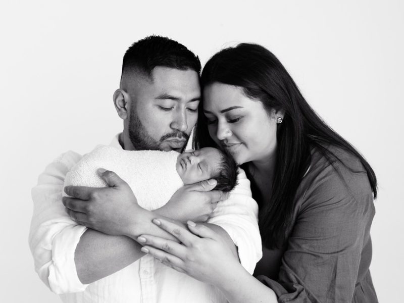 dad-and-mum-holding-their-baby-adelaide
