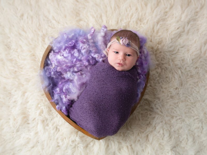 newborn-baby-in-a-love-heart-bowl