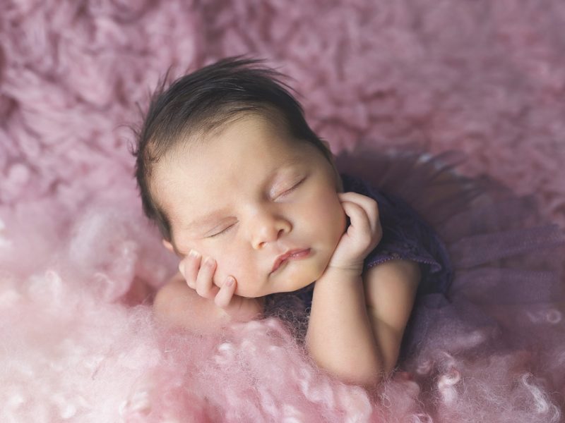 sweet-baby-girl-posed-fro-her-newborn-session